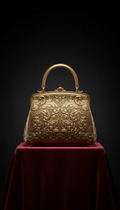 Gilded bronze top-handle handbag
